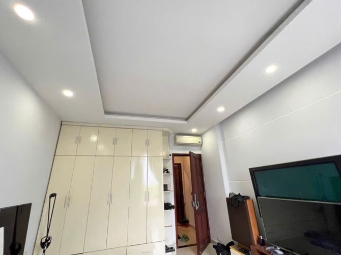 BÌNH THẠNH - MẶT TIỀN THỤT CHỢ BÀ CHIỂU - DT (4Mx8M) 4 TẦNG BTCT - VỊ TRÍ ĐẮC ĐỊA - 5